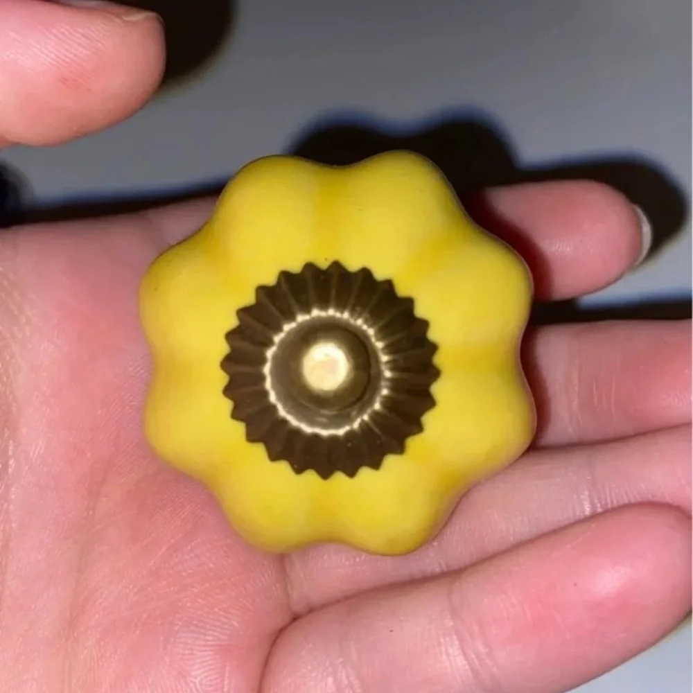 Pier 1 Drawer knobs set of 8 2 in each color( white,yellow, red, blue)